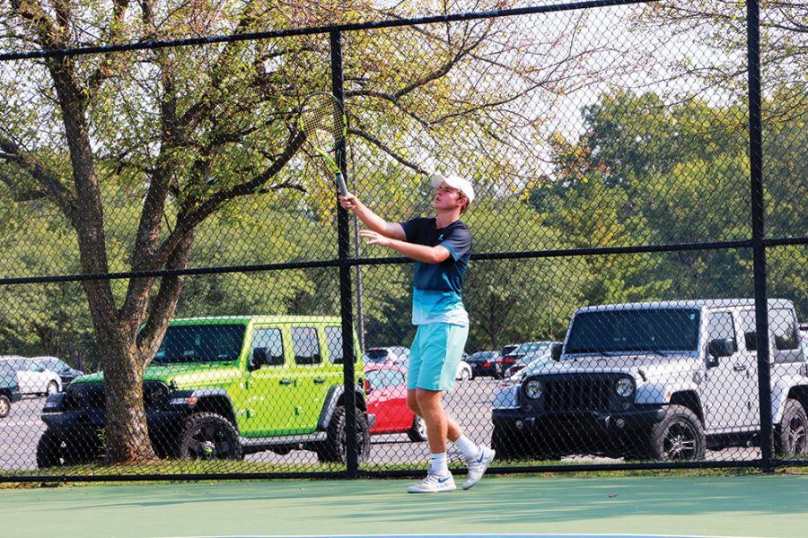 Senior Presley Thienemen works on his skills during practice. According to tennisrecruiting.net, Thienemen is a five-star recruit for the sport.