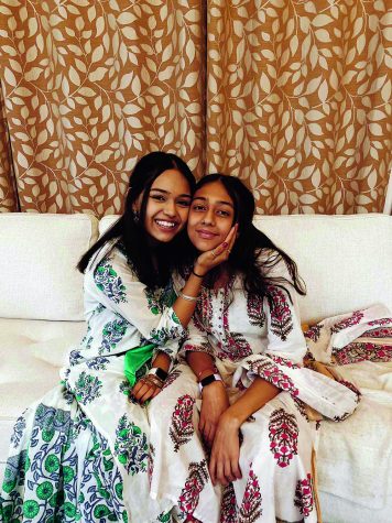 Submitted Photos || Rishma Chauhan
Senior Rishma Chauhan poses with her sister, Raya Chauhan, on Diwali, the festival of lights that celebrates Rama’s return to his kingdom.   Chauhan said at first she rejected her culture but later learned how to appreciate it.