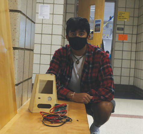 On Sept. 21, Shiva Viswanath, InvenTeam member and senior, shows off the makings of the InvenTeam’s newest invention. 