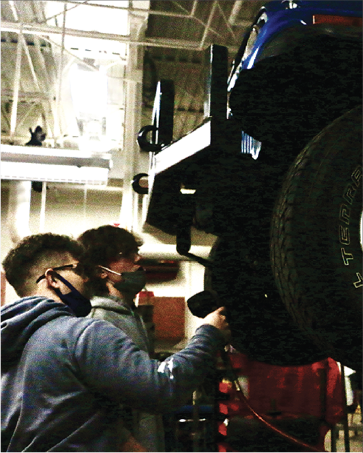 Students work their way through various automotive experiences to learn how to maintain and repair automobiles in an engineering class at CHS. Engineering teacher Sidney Swartzen-druber said Project Lead the Way (PLTW) classes like this one are designed around the problem-solving process.