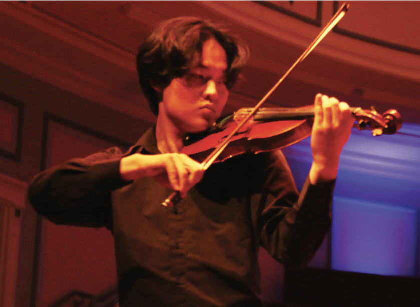 Photo || Daniel Tian
Senior Brayden Meng plays the violin at the WHAM Palladium performance on Sept. 28, 2022.